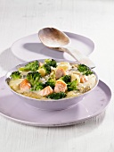 Gnocchi with salmon and broccoli in a creamy cheese sauce