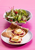 Goat's cheese and raspberry tartlets and a side salad