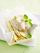 Cod with white asparagus in parchment paper