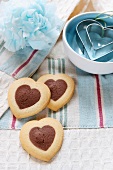 Heart-shaped biscuits and heart-shaped cutters