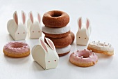 Assorted doughnuts and Easter bunnies made from paper