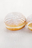 Doughnuts dusted with icing sugar