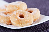 Doughnuts dusted with icing sugar