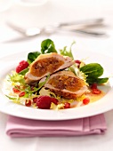 Guinea fowl with a fig filling on a fruity salad