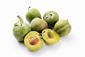 Greengages, whole and halved