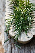 Fresh rosemary in a wooden bowl