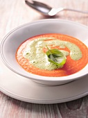 Cream of tomato soup with basil foam
