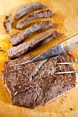 Slicing Steak on a Cutting Board