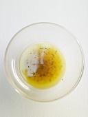 Lemon vinaigrette in a glass bowl