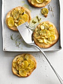Mini pizzas with potatoes and rosemary