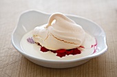 Yogurt dessert with fresh raspberries and meringue