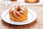 Maple Frosted Doughnuts on a White Plate