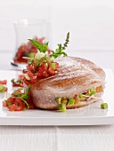 Stuffed tuna fish steak with tomato salsa