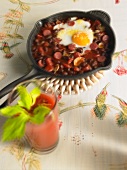 Chilli con carne with a fried egg - hangover breakfast