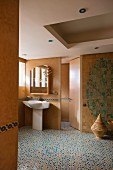 A spacious bathroom with moroccan tile floor or Zellige floor