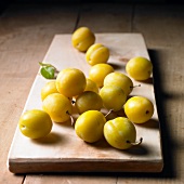 Mirabelles on a wooden board