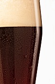 A glass of dark wheat beer