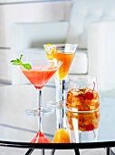 Various cocktails on a glass table