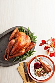 Whole Turkey on a Platter; Turkey Leg with Sides