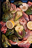 Roast lamb with artichokes, garlic and lemon