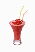 A raspberry shake with straws