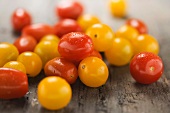 Wet red and yellow tomatoes