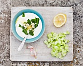 Cold yoghurt soup with herbs, garlic, cucumber and lemons