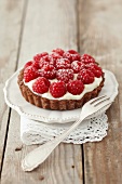 Chocolate tarts with raspberries