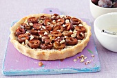 Plum tart with almonds