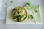 Broccoli with garlic, topped with cheese and baked