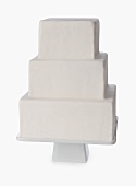 Plain Three Tiered White Cake Ready to be Decorated; White Background