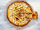 An asparagus and courgette quiche, sliced