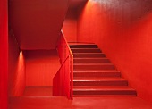 Vibrant red, monochrome staircase