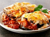 Gratinated aubergines with tomato sauce