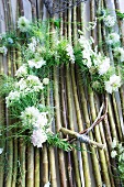 Wreath made of nigella, cow parsley, campion and soft-pink mini carnations