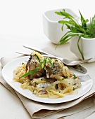 Marinated carp with onions