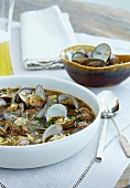 Bowl of Clam Soup with Orzo and Meatballs