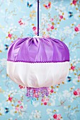 Hand-crafted pendant lamp with purple and white lampshade