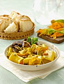 Paccheri Di Gragnano with courgette flowers and clams (Italy)