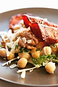 Chickpea salad with fried ham and walnuts