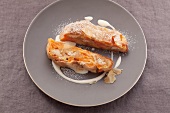 Apricot strudel on a grey plate