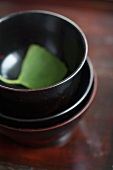 A ginkgo leaf in a tea bowl
