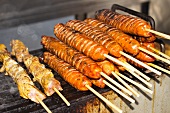 Pork and Chorizo Kabobs on a Food Cart