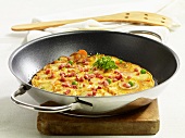 A country omelette in a pan