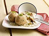 Bread dumplings with a chanterelle mushroom sauce