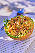 Pasta salad in a hollowed out melon