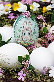 A handmade Easter egg with a bunny motif