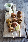 Mushroom kebabs with a herb dip