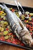 Sea bass on bed of vegetables