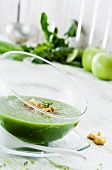 Green gazpacho in a glass bowl